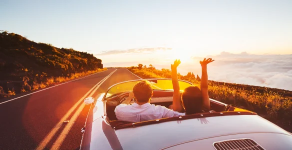happy couple in a car