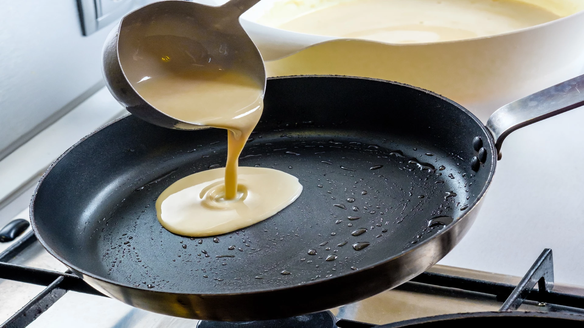 pancake batter in the skillet